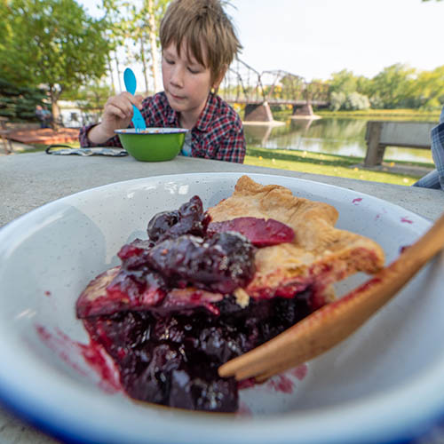 Enjoying homemade pie along the Missouri River