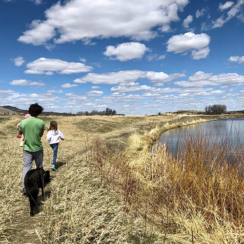 Family exploring Pelican Point outside of Cascade